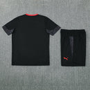 Conjunto entrenamiento hombre AC Milan temporada 2025 2026 oficial negro camiseta y pantalón técnica transpirable pro serie a kit milanello.