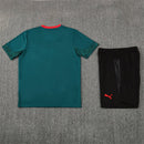 Conjunto entrenamiento hombre AC Milan temporada 2025 2026 oficial verde camiseta y pantalón negro técnica transpirable pro serie a kit.
