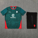 Conjunto entrenamiento hombre AC Milan temporada 2025 2026 oficial verde camiseta y pantalón negro técnica transpirable pro serie a kit.