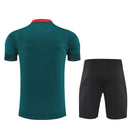 Conjunto entrenamiento hombre AC Milan temporada 2025 2026 oficial verde camiseta y pantalón negro técnica transpirable pro serie a kit.