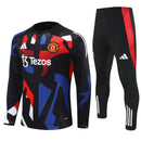 CONJUNTO LARGO MANCHESTER UNITED ENTRENAMIENTO 24/25 HOMBRE