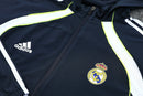 CHÁNDAL REAL MADRID CON CHAQUETA CORTAVIENTO Y PANTALÓN 25/26 HOMBRE