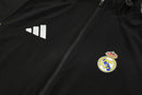CHÁNDAL REAL MADRID CON CHAQUETA CORTAVIENTO Y PANTALÓN 25/26 HOMBRE