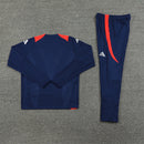 CONJUNTO LARGO MANCHESTER UNITED ENTRENAMIENTO 24/25 HOMBRE