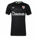 Camiseta Athletic Bilbao Cuarta Equipación Negro 24/25 Hombre. Con un diseño elegante y moderno, la camiseta de cuarta equipación del Athletic Bilbao para la temporada 2024/25 ofrece un look sofisticado y lleno de estilo. De color negro con detalles en contraste, esta camiseta destaca por su diseño innovador, ideal para los verdaderos seguidores del club que buscan algo único. El escudo del Athletic Bilbao está bordado en el pecho, reafirmando el orgullo por el equipo. Fabricada con materiales de alta calid