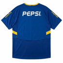Camiseta Boca Juniors Primera Equipación 2003/04 Hombre Retro Oficial - Boca Juniors, CA Boca Juniors, Xeneizes, La Bombonera, Superliga Argentina, Copa Libertadores, Intercontinental, Argentine Football, Nike, Carlos Tevez, Guillermo Barros Schelotto, Rolando Schiavi, Carlos Bianchi, 2003, 2004, Retro, Vintage, Camiseta Clásica, Primera Equipación, Home Kit, Azul, Blue, Oro, Gold, Yellow, Hombre, Men, Camiseta de Hombre, Tienda Hincha Futbolero, Fútbol Argentino