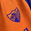 Málaga CF 2026, Camiseta Málaga oficial, Tercera equipación Málaga, Ropa oficial Málaga CF, Camiseta fútbol hombre, Regalo fútbol hombre Málaga, Camiseta alternativa España, Jersey Málaga 25/26, Malaguista lifestyle kit, Comprar camiseta barata, Tienda Hincha Futbolero.