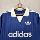Camiseta polo hombre portero Adidas oficial azul detalles blancos fútbol técnica transpirable guardameta entrenamiento estilo retro.