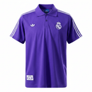 Polo hombre Real Madrid temporada 2025 2026 oficial púrpura morado camiseta de paseo técnica transpirable elegante fútbol madridista Bernabéu.
