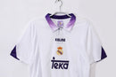 Camiseta oficial del Real Madrid primera equipación temporada 1997 1998 blanca retro para hombre de Tienda Hincha Futbolero, diseño histórico de la Séptima, Camiseta Real Madrid retro, Real Madrid 97/98, Ropa Real Madrid vintage, Comprar camiseta Madrid blanca, Los Blancos, Champions League, Camisetas fútbol retro, Retro Real Madrid 1998, Historia Real Madrid, Colección Madrid, La Liga.