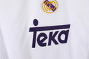 Camiseta oficial del Real Madrid primera equipación temporada 1997 1998 blanca retro para hombre de Tienda Hincha Futbolero, diseño histórico de la Séptima, Camiseta Real Madrid retro, Real Madrid 97/98, Ropa Real Madrid vintage, Comprar camiseta Madrid blanca, Los Blancos, Champions League, Camisetas fútbol retro, Retro Real Madrid 1998, Historia Real Madrid, Colección Madrid, La Liga.