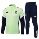 Chándal completo hombre Real Madrid temporada 2025 2026 oficial chaqueta verde pantalón negro fútbol técnica transpirable entrenamiento Madridista.