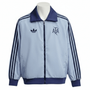 Argentina 2026, Cortaviento Argentina oficial, Chaqueta Argentina 25/26, Ropa oficial AFA, Windbreaker fútbol hombre, Regalo fútbol hombre Argentina, Chaqueta azul Argentina, Cortaviento 3 estrellas, Argentina lifestyle kit, Comprar cortaviento barato, Tienda Hincha Futbolero.