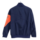 Chaqueta cortaviento hombre FC Barcelona 2025 2026 diseño T90 azul marino detalles naranja sin capucha entrenamiento oficial fútbol culé 25/26 impermeable.