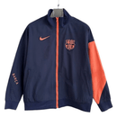 Chaqueta cortaviento hombre FC Barcelona 2025 2026 diseño T90 azul marino detalles naranja sin capucha entrenamiento oficial fútbol culé 25/26 impermeable.