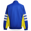 Boca Juniors 2026, Cortaviento Boca oficial, Chaqueta Boca 25/26, Ropa oficial Boca Juniors, Windbreaker fútbol hombre, Regalo fútbol hombre Boca, Chaqueta azul Boca, Cortaviento sin capucha, Boca Juniors lifestyle kit, Comprar cortaviento barato, Tienda Hincha Futbolero.