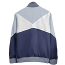 Tottenham 2026, Cortaviento Tottenham oficial, Chaqueta Spurs 25/26, Ropa oficial Tottenham Hotspur, Windbreaker fútbol hombre, Regalo fútbol hombre Tottenham, Chaqueta azul marino Premier League, Cortaviento sin capucha, Tottenham lifestyle kit, Comprar cortaviento barato.
