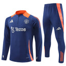 CONJUNTO LARGO MANCHESTER UNITED ENTRENAMIENTO 24/25 HOMBRE