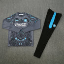 Conjunto entrenamiento hombre SSC Napoli temporada 2025 2026 oficial gris sudadera y pantalón negro técnica transpirable pro serie a kit partenopeo.