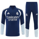 Conjunto hombre Real Madrid temporada 2026 2027 oficial sudadera azul marino pantalón largo fútbol técnica transpirable entrenamiento galáctico Bernabéu.