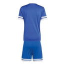 Conjunto fútbol infantil Selección Curazao temporada 2026 2027 oficial camiseta y pantalón corto azul técnica transpirable FFK estilo caribeño niños.