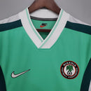 Camiseta hombre selección de Nigeria mundial 1998 primera equipación verde retro calidad 1.1 premium Super Eagles Tienda Hincha Futbolero. Nigeria 1998, Camiseta Nigeria retro, Ropa Nigeria fútbol, Camiseta Nigeria 98 verde, Calidad 1.1 Nigeria, Jay-Jay Okocha Jersey, Tienda Hincha Futbolero, Nigeria Retro Jersey 1998.