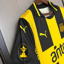 Camiseta hombre Peñarol temporada 2025 2026 primera equipación local listrada amarillo y negro escudo bordado calidad 1.1 oficial, Peñarol 2025, Camiseta Peñarol local, Peñarol 25/26, Camiseta Oro y Carbón, Camiseta barata Peñarol, Calidad 1.1 Uruguay, Fútbol Uruguayo 2026, Tienda Hincha Futbolero, Manya, Bloke Core Carbonero.