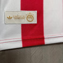 POLO OLIMPIACOS 100 AÑOS 25/26 HOMBRE - TIENDA HINCHA FUTBOLERO