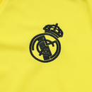 Sudadera hombre Real Madrid temporada 2025 2026 color amarilla oficial fútbol merengue técnica transpirable entrenamiento urbana premium.