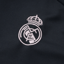 Sudadera hombre Real Madrid temporada 2025 2026 color gris oscuro oficial fútbol merengue técnica transpirable entrenamiento urbana antracita.